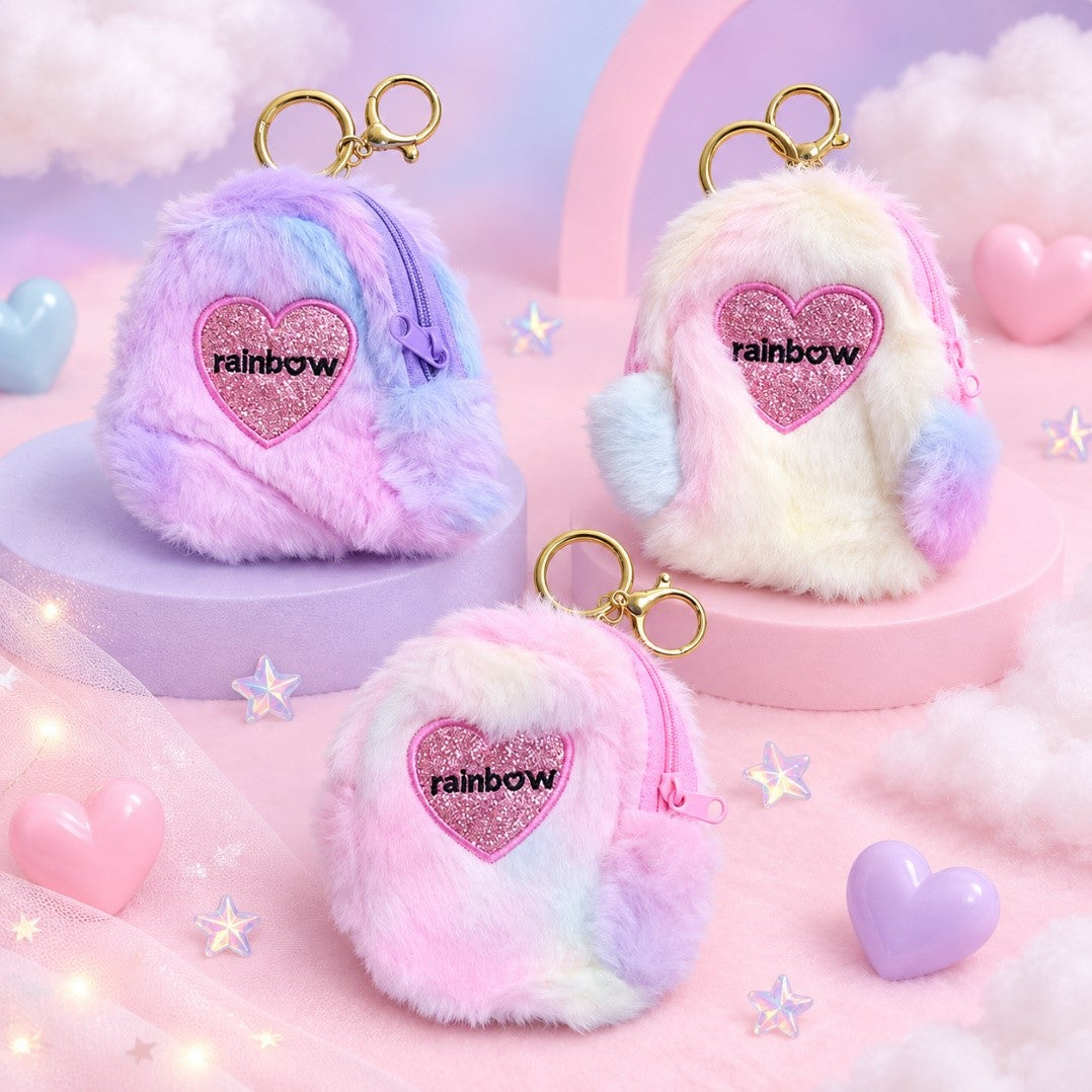 Fluffy pouch in rainbow pastel fur shaped like a mini backpack with glitter heart and gold keyring